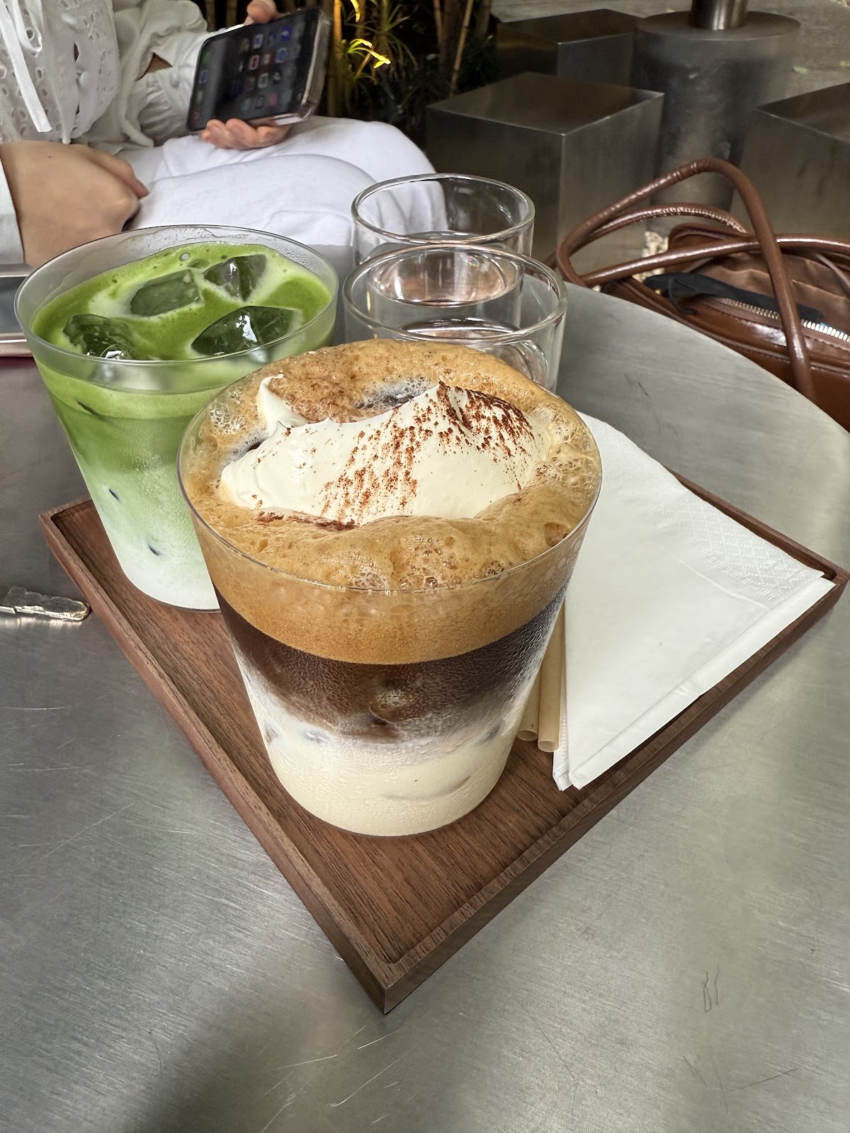 Fluffy Cloud and layered matcha on a wooden tray