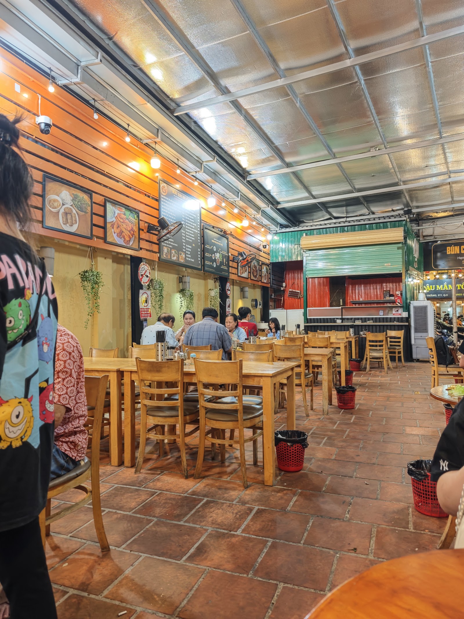 The shop's dining hall — simple wooden tables, bright