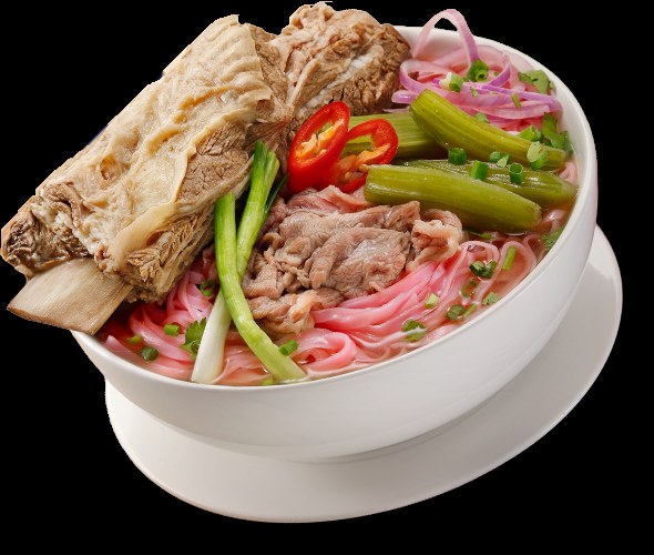 The artichoke beef-rib pho — rib tower, pink noodles, artichoke stems