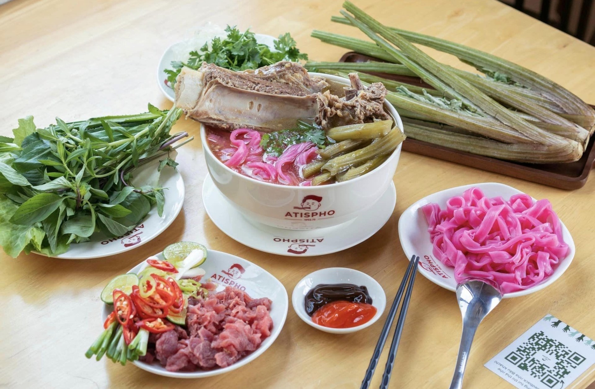 The artichoke feast — rib bowl, herbs, pink noodles, artichoke stems
