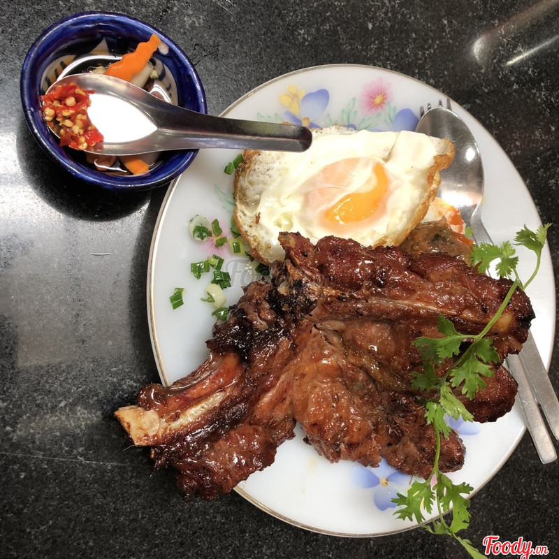 Chop with a sunny-side egg