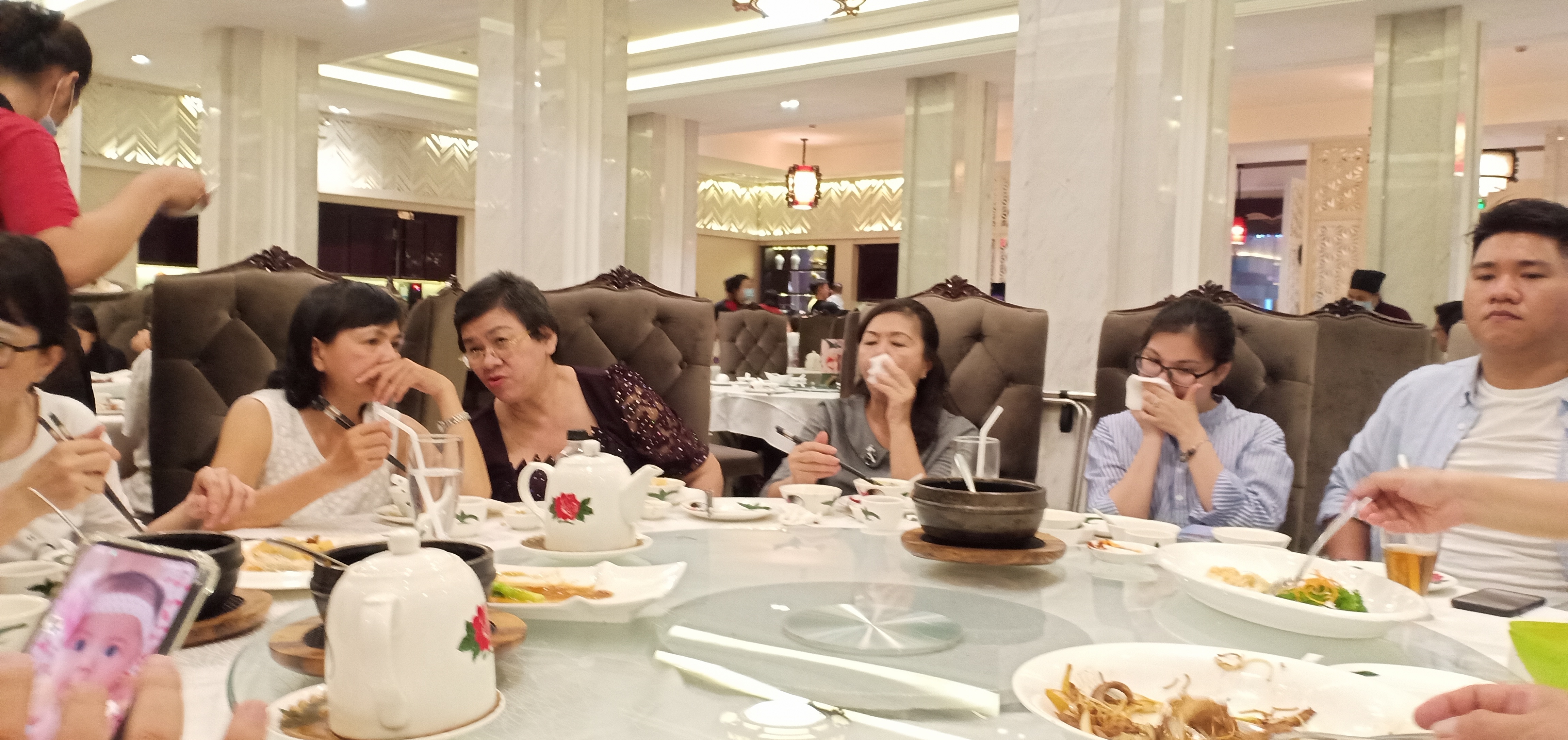 The lantern-warm dining room at Dim Tu Tac