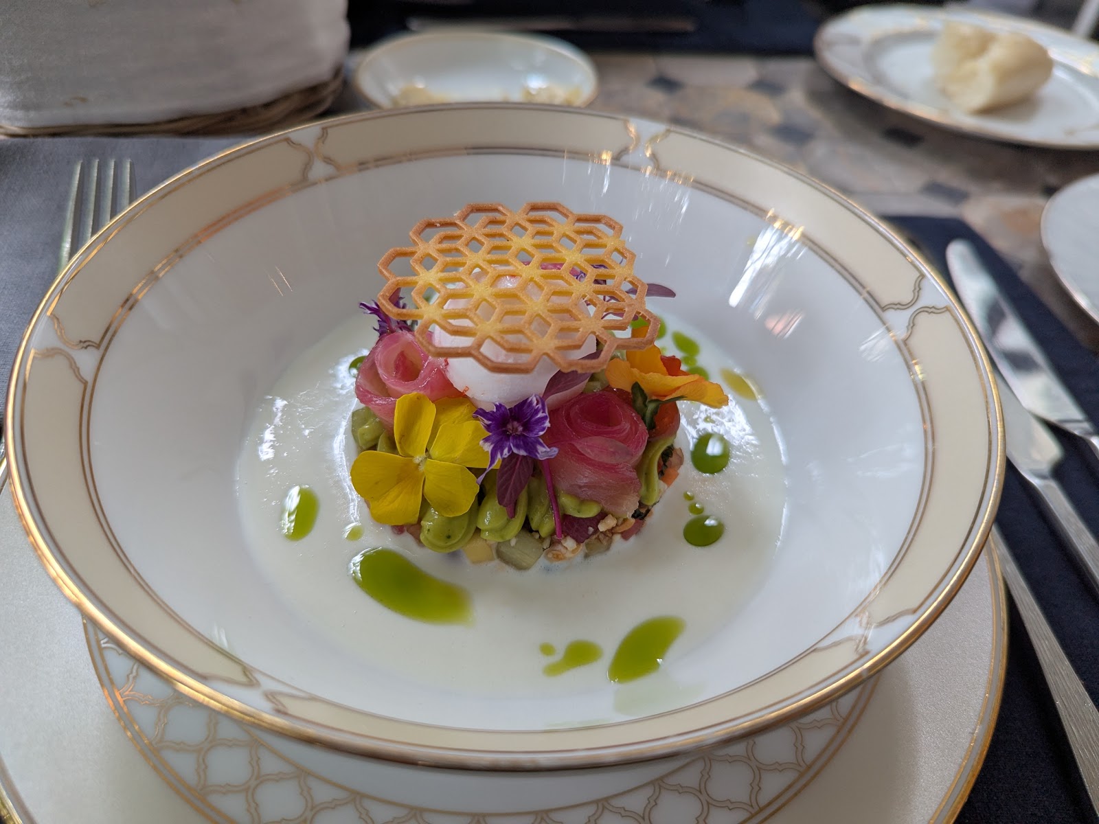 Tuna tartare with edible flowers and a lattice crisp