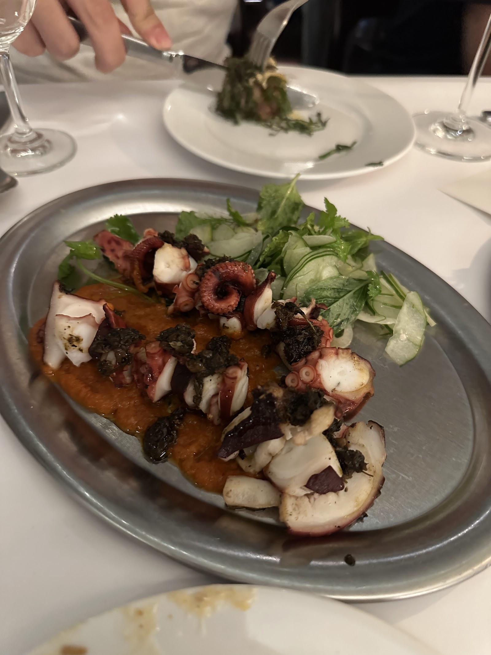 Grilled octopus with fresh herbs