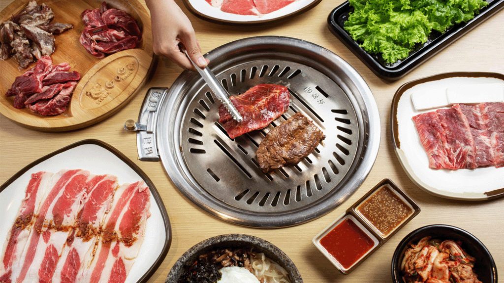 The GoGi grill from above — meat and banchan