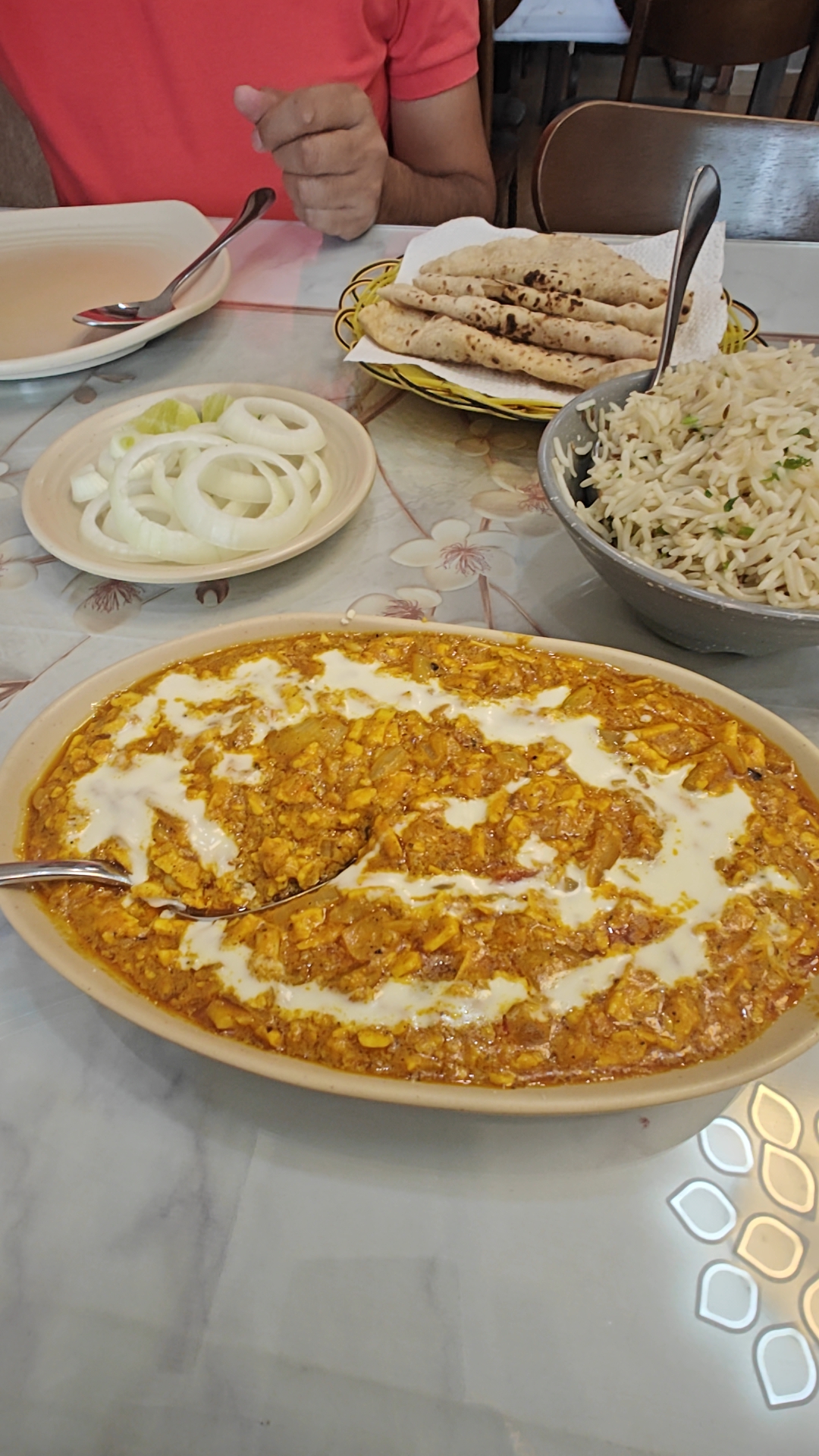 The Gujarat table: paneer, rice, roti and onions