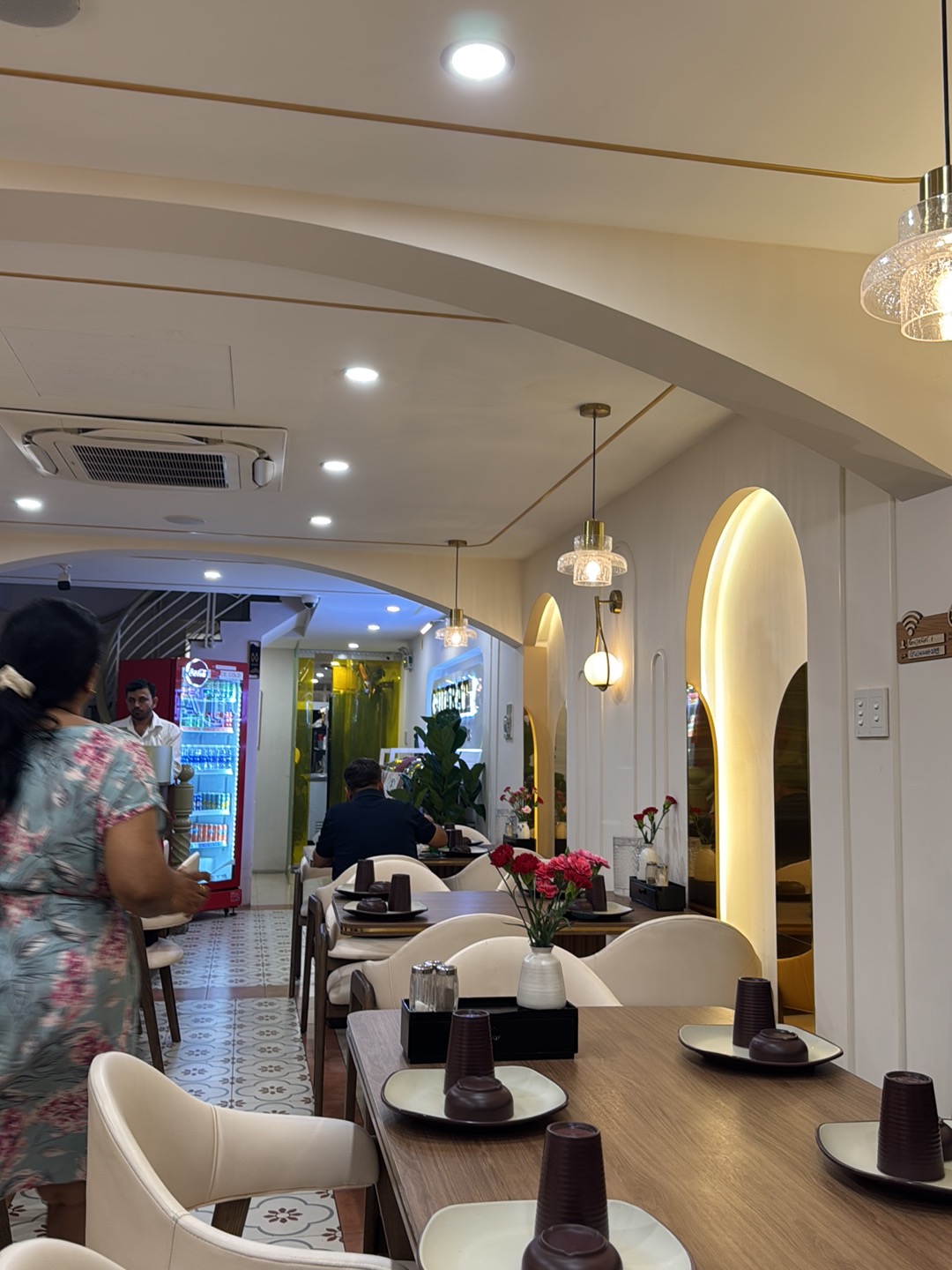 The Gujarat dining room with glowing wall niches