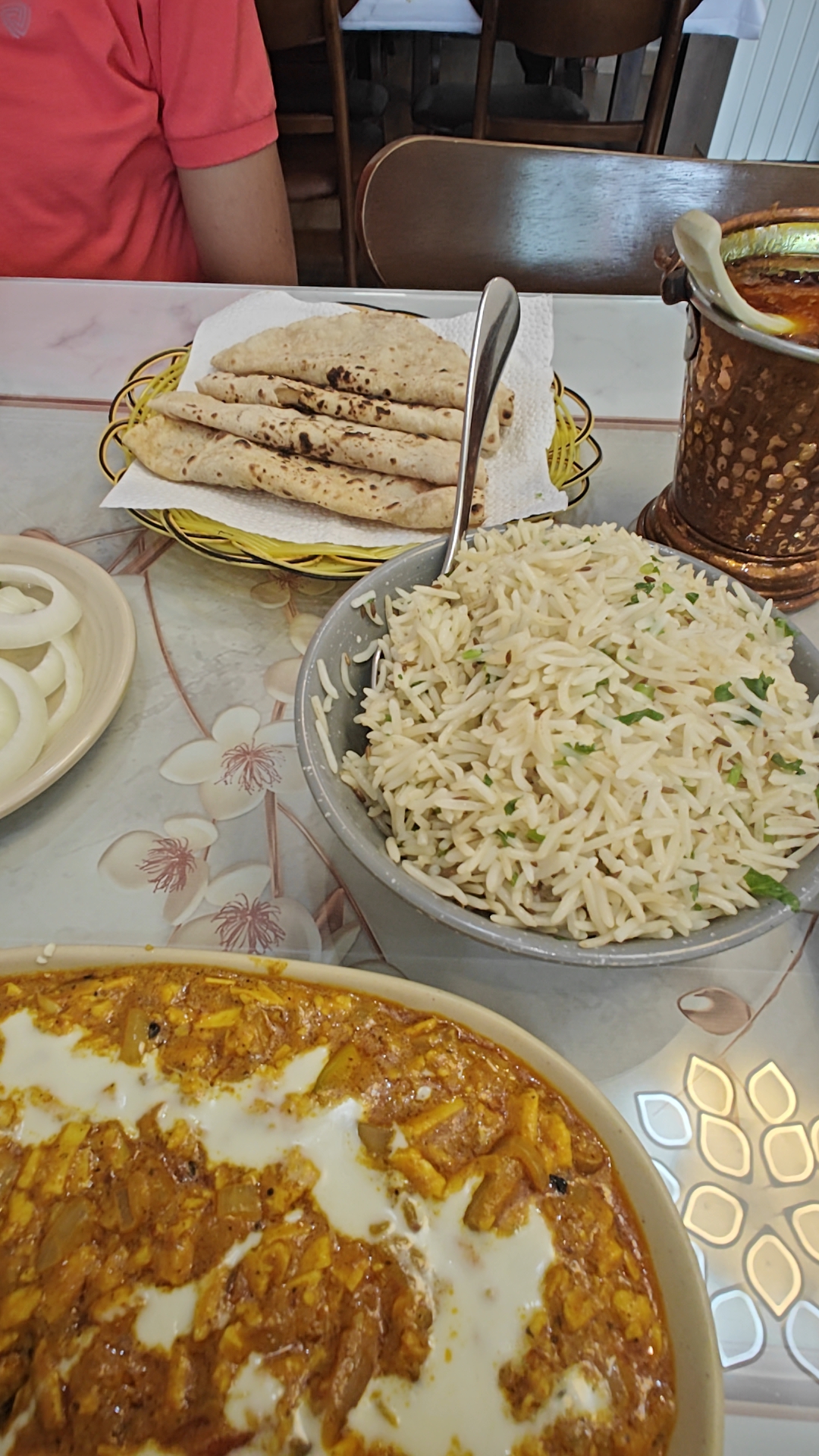 The veg spread: paneer, jeera rice, roti, onions