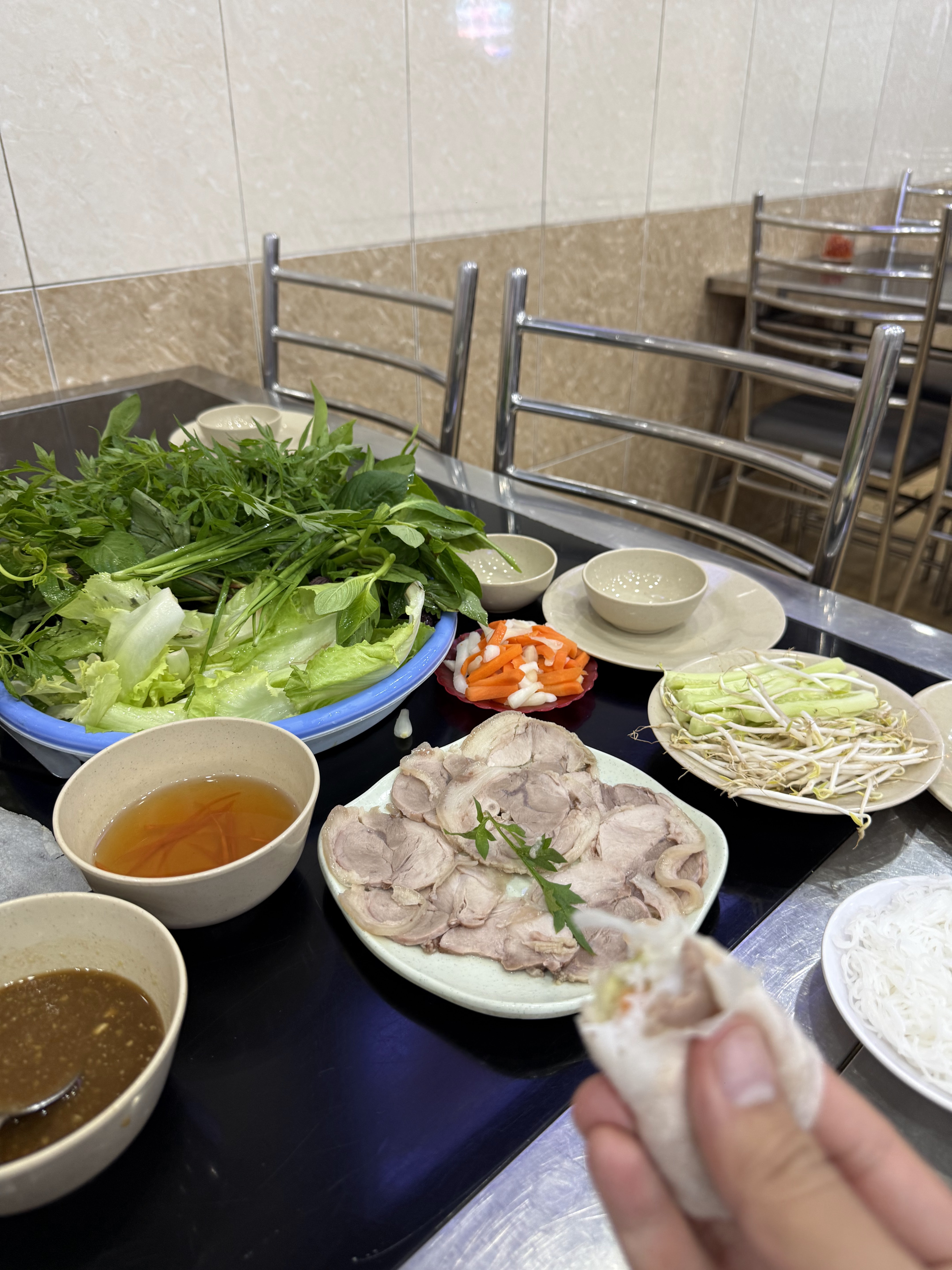 Steamed pork rice-paper rolls at Hoang Ty