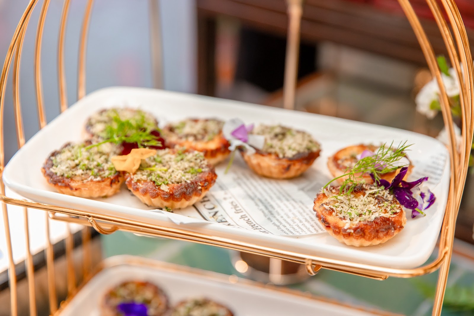 Savory tartlets on the golden birdcage pastry stand