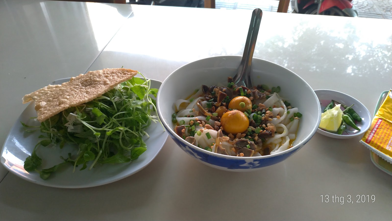 The Ăn Là Ghiền Hoi An-style shredded chicken rice — the second signature (pending the venue photo pass)