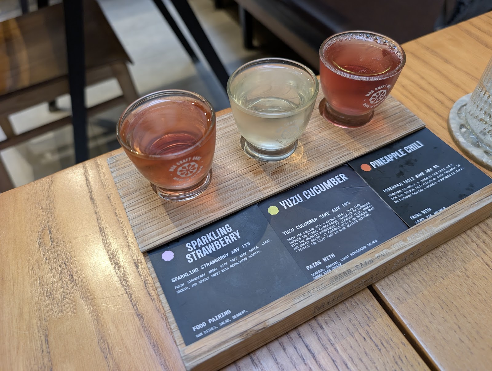 Three-pour flight: sparkling strawberry, yuzu cucumber, pineapple chili