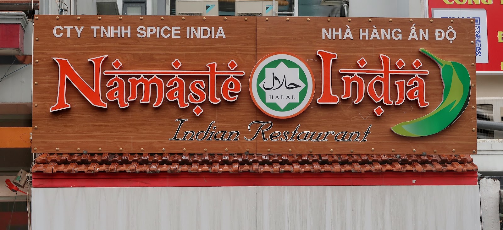 The Namaste India wooden sign
