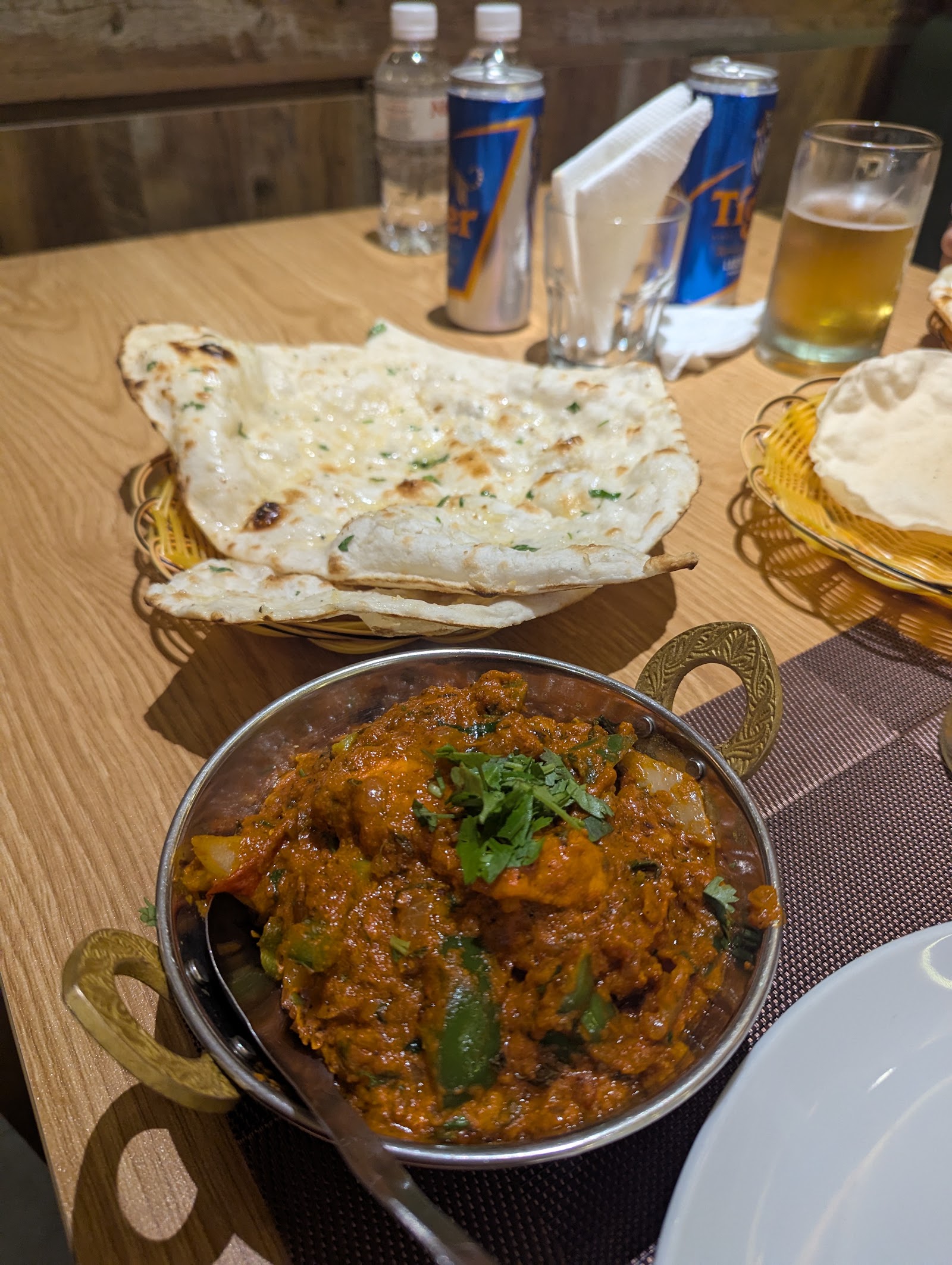 Kadai chicken in a brass bowl