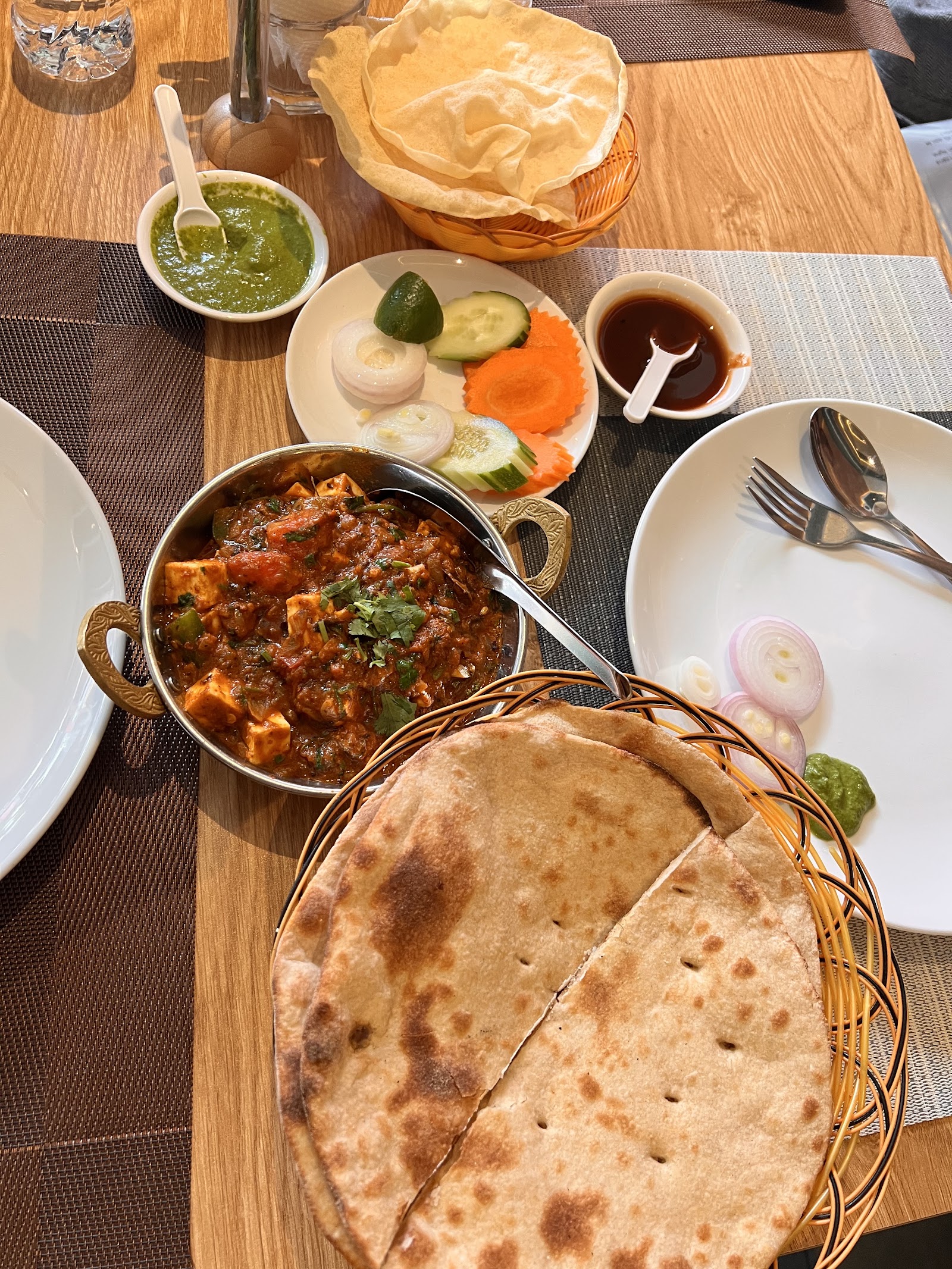 Kadai paneer in a brass bowl