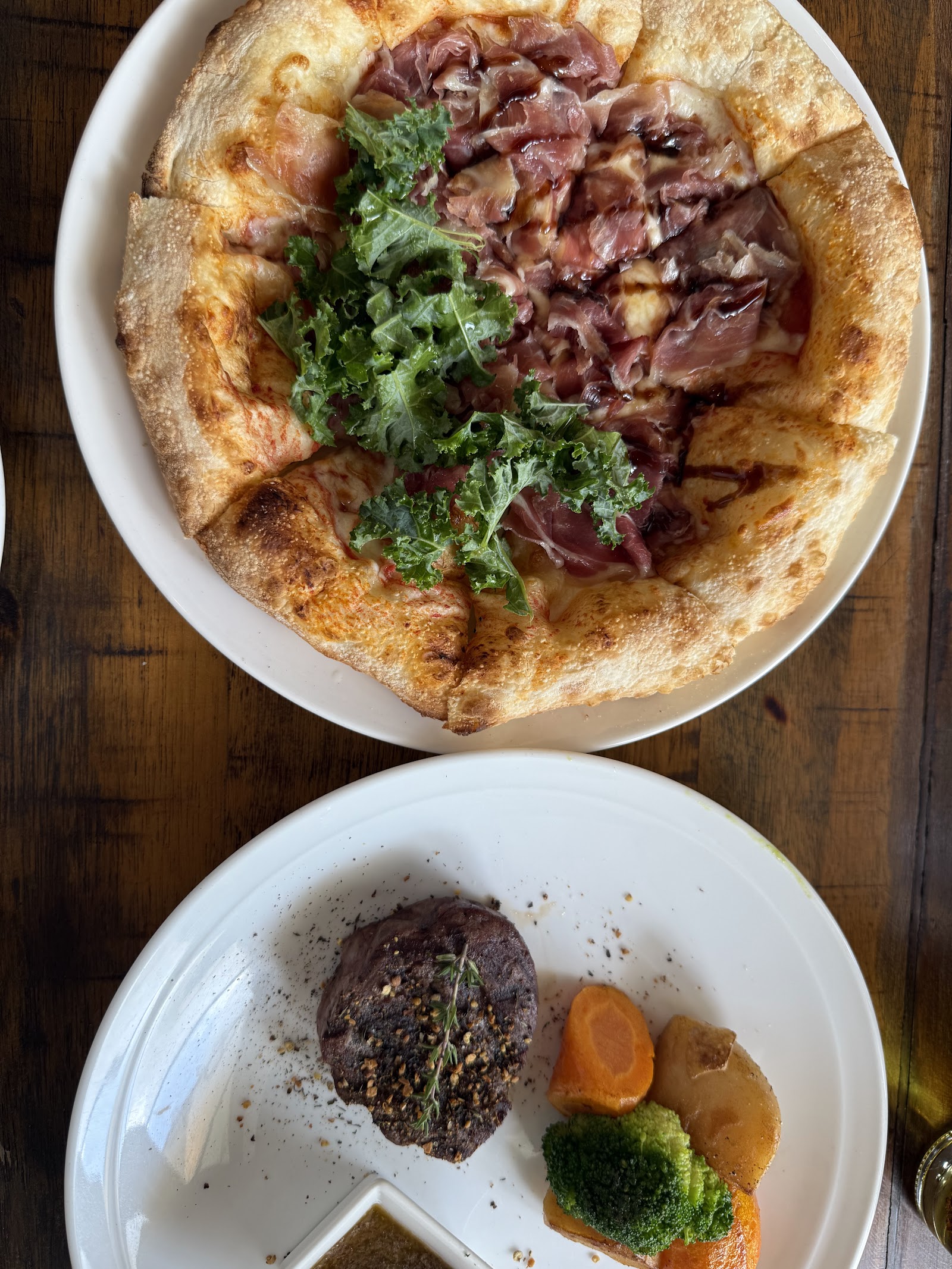 Prosciutto and kale pizza, steak medallion plate
