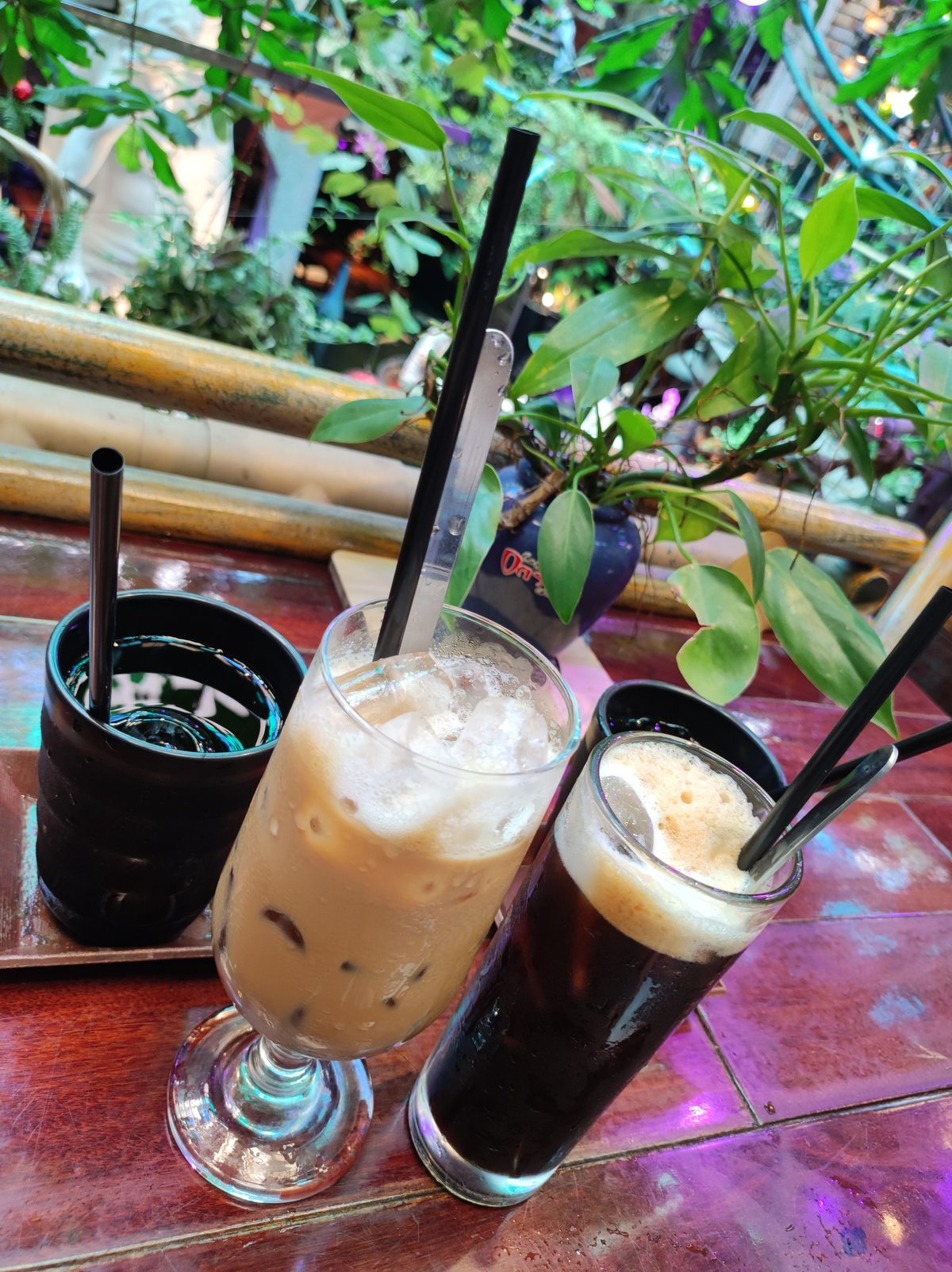 Iced coffees on a wooden table