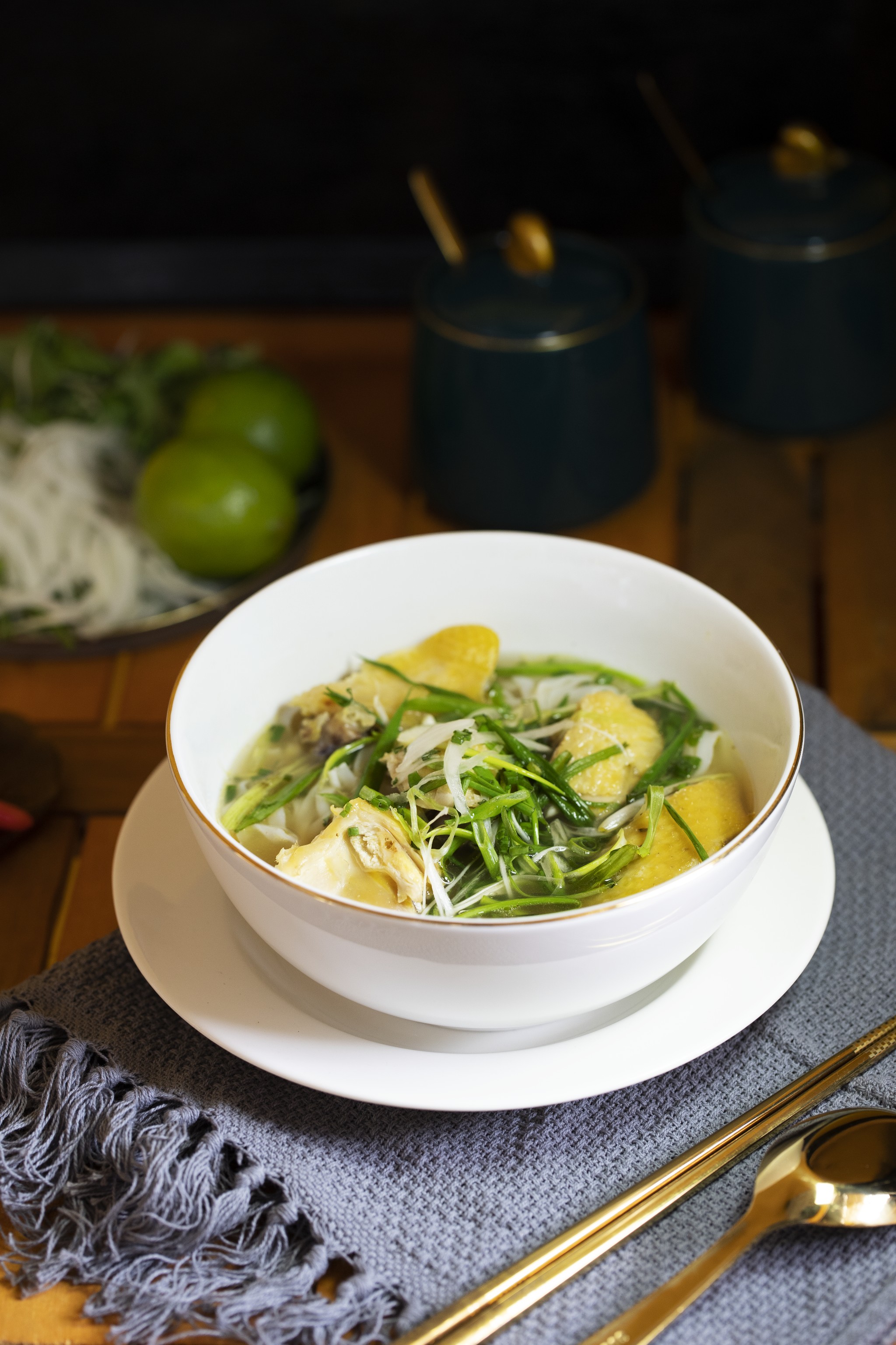 The golden wall and the framed dish strip — Pho Ga Ngo Vang