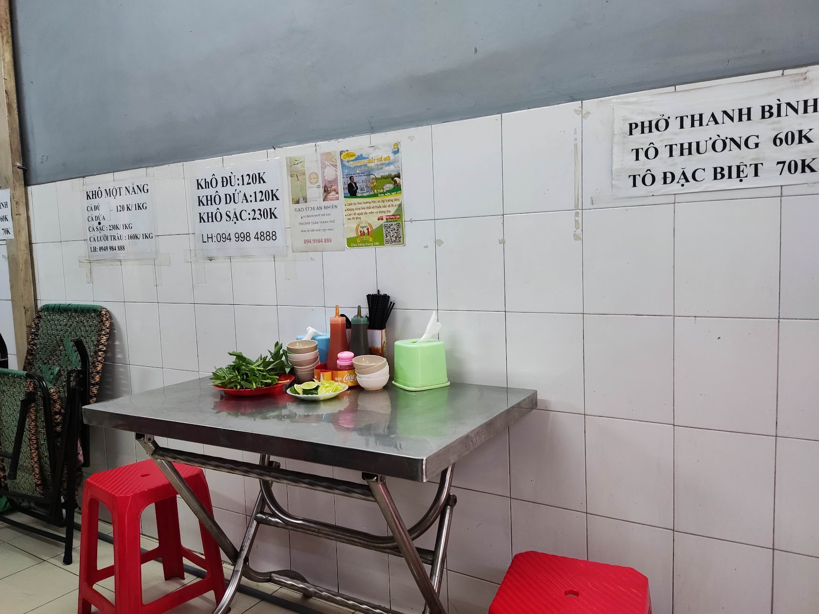 The price board on the shop wall — two dishes, two prices