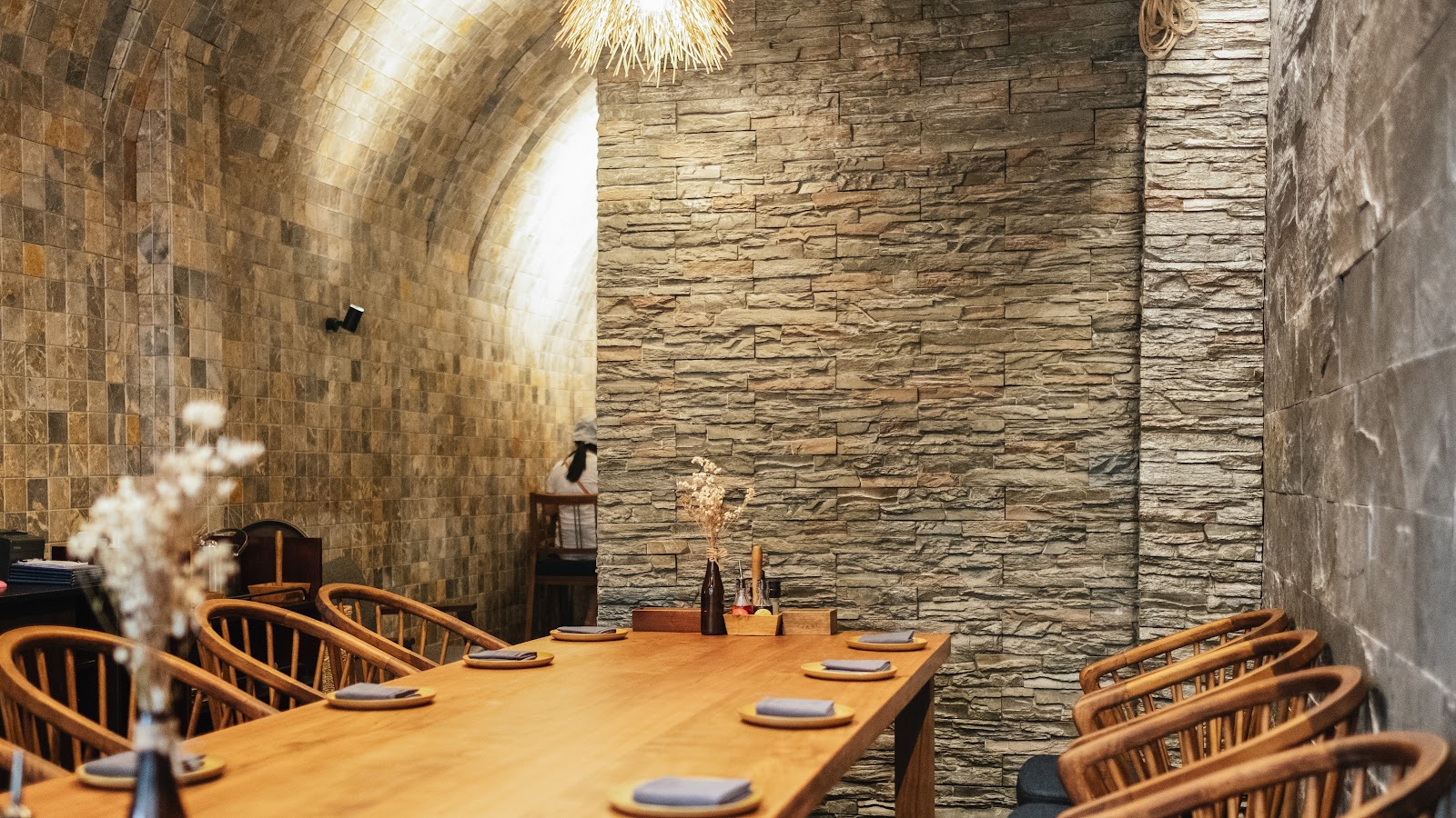 The stone-walled room in the alley