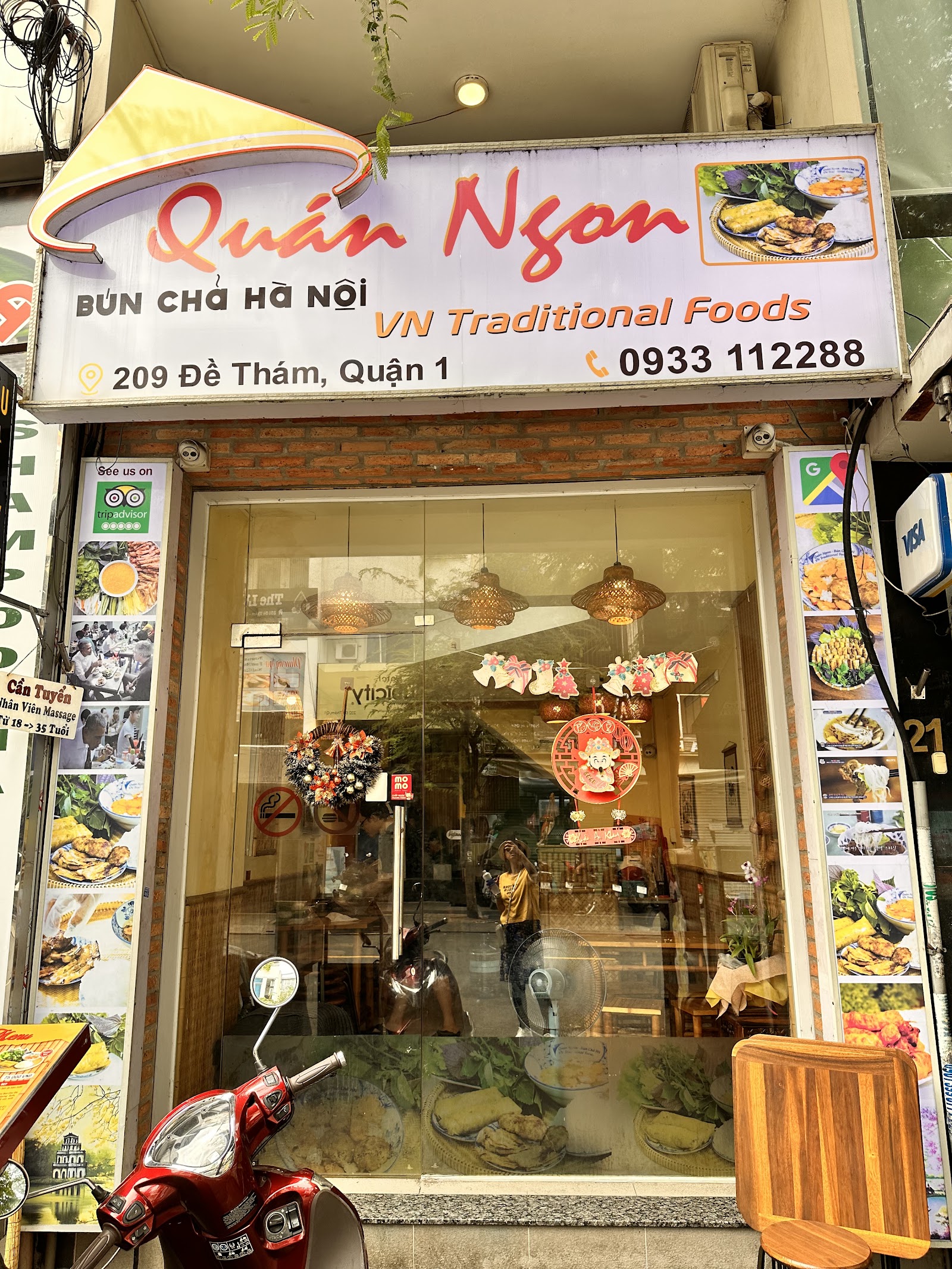The Quán Ngon - Bún Chả Hà Nội storefront — the sign reads Quán Ngon, Bún Chả Hà Nội, 209 De Tham