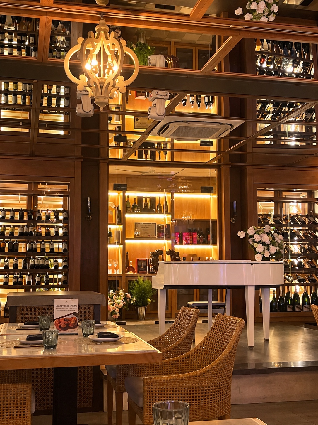 The wine cellar with its white piano
