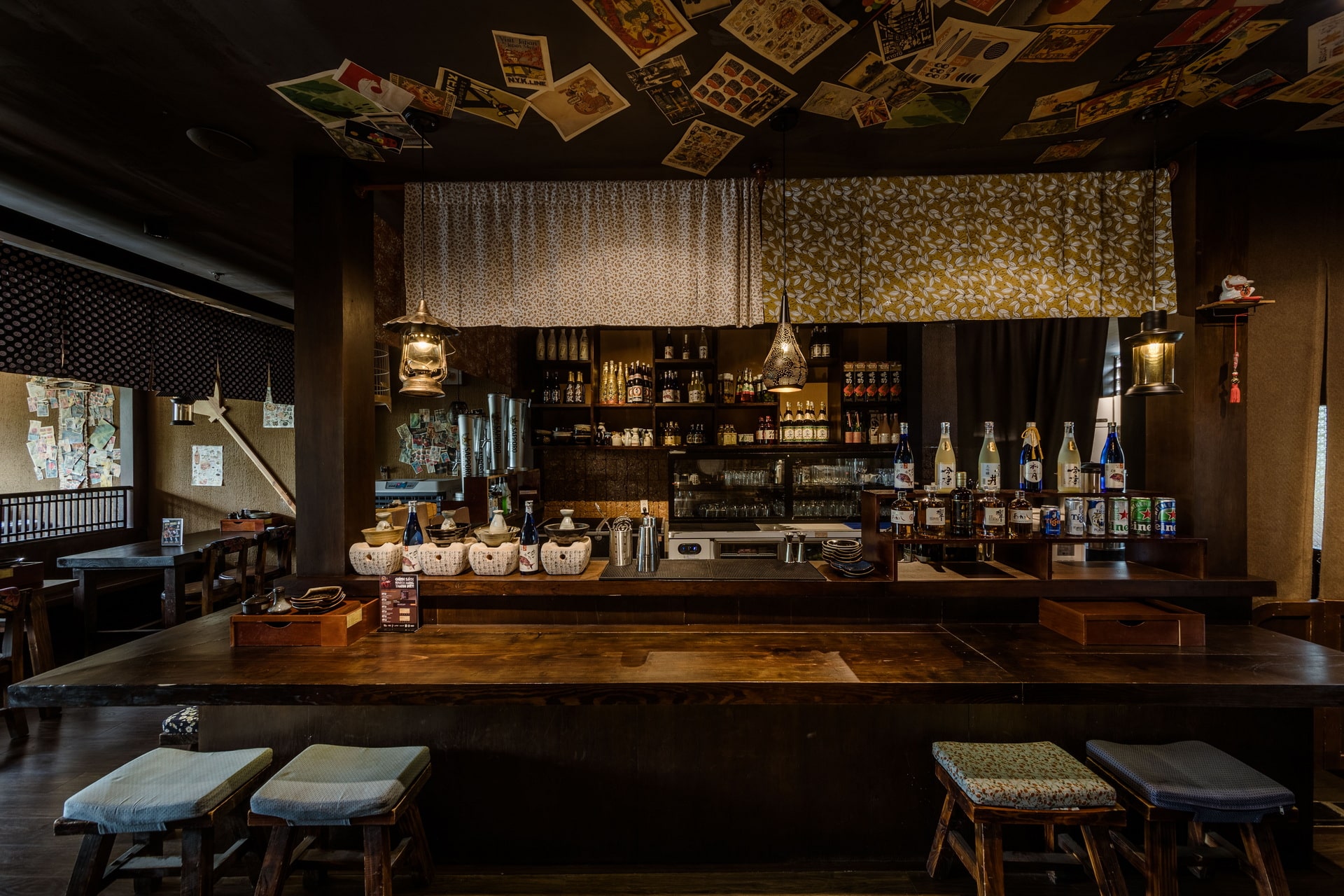 The sake bar with its vintage Japanese poster ceiling