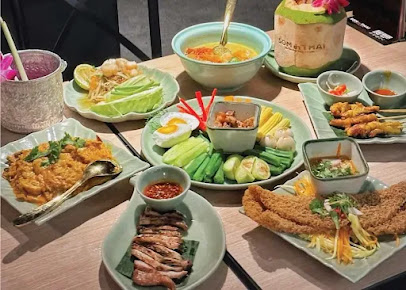 A feast of som tam, tom yum and grilled dishes