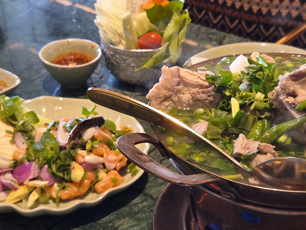 Hotpot and salmon salad on the table