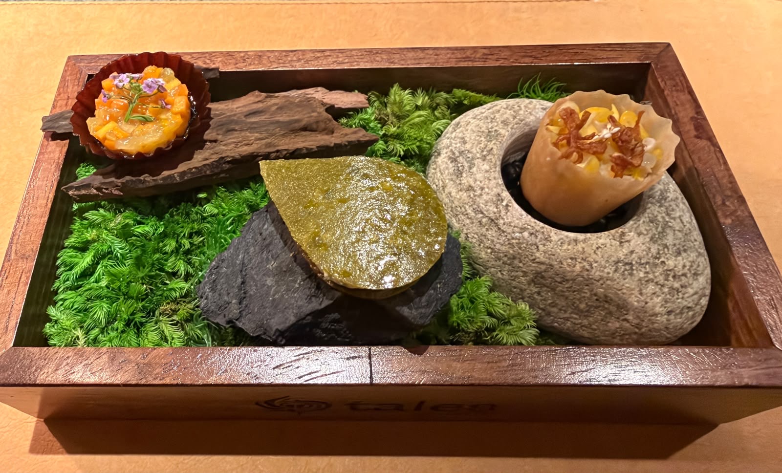 Wooden moss tray with three appetizers