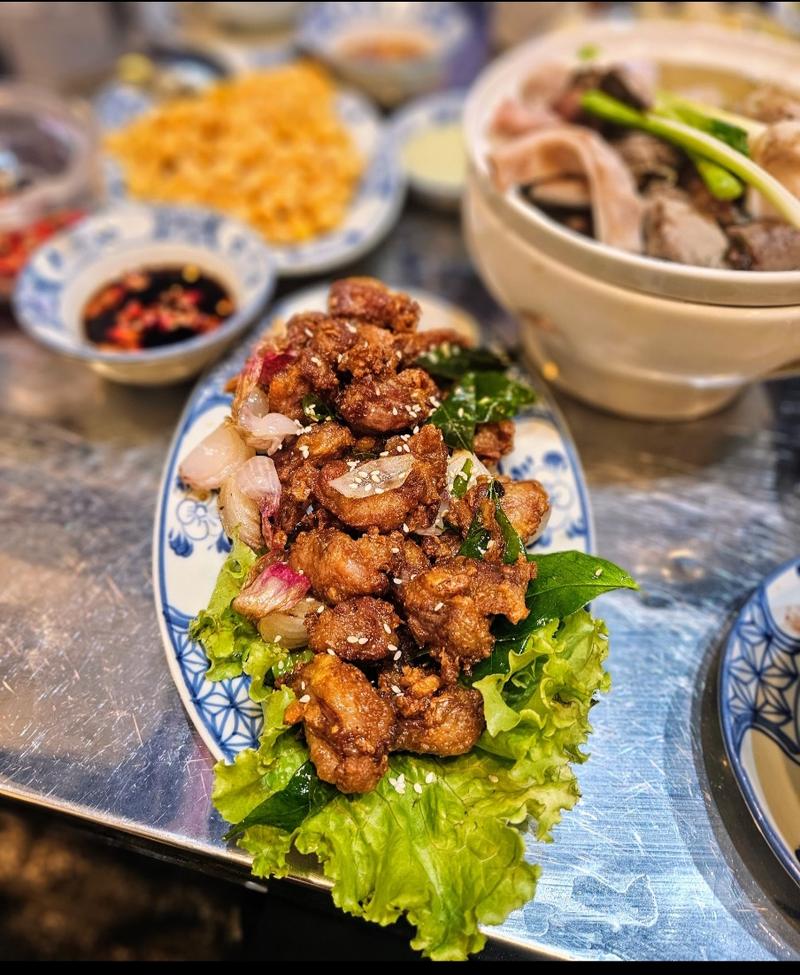 Crispy fried pork intestine on lettuce